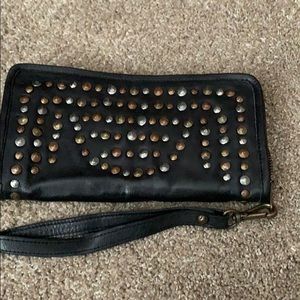 Leather studded wristlet